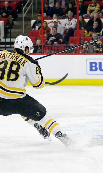 Marchand, Bruins stop Hurricanes 3-2